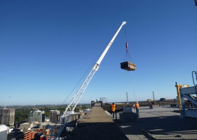 Crane Lifting Heavy Contrustions Materials - Building Inspections Sydney - Magellan Company