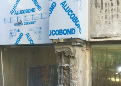 Exposed Reinforcing Steel And Installation Of New Cladding - Concrete Repairs - Magellan Company