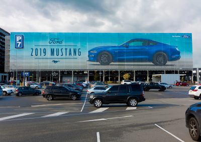 Mustang Banner - Facade Services - Magellan Company