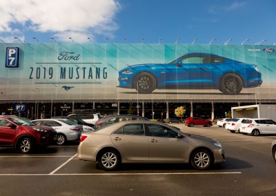 Mustang Banner At The Carpark - Concrete Restoration - Magellan Company